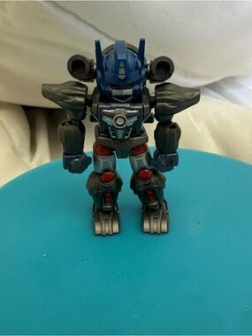 Hasbro Blue and Gray Robot Action Figure